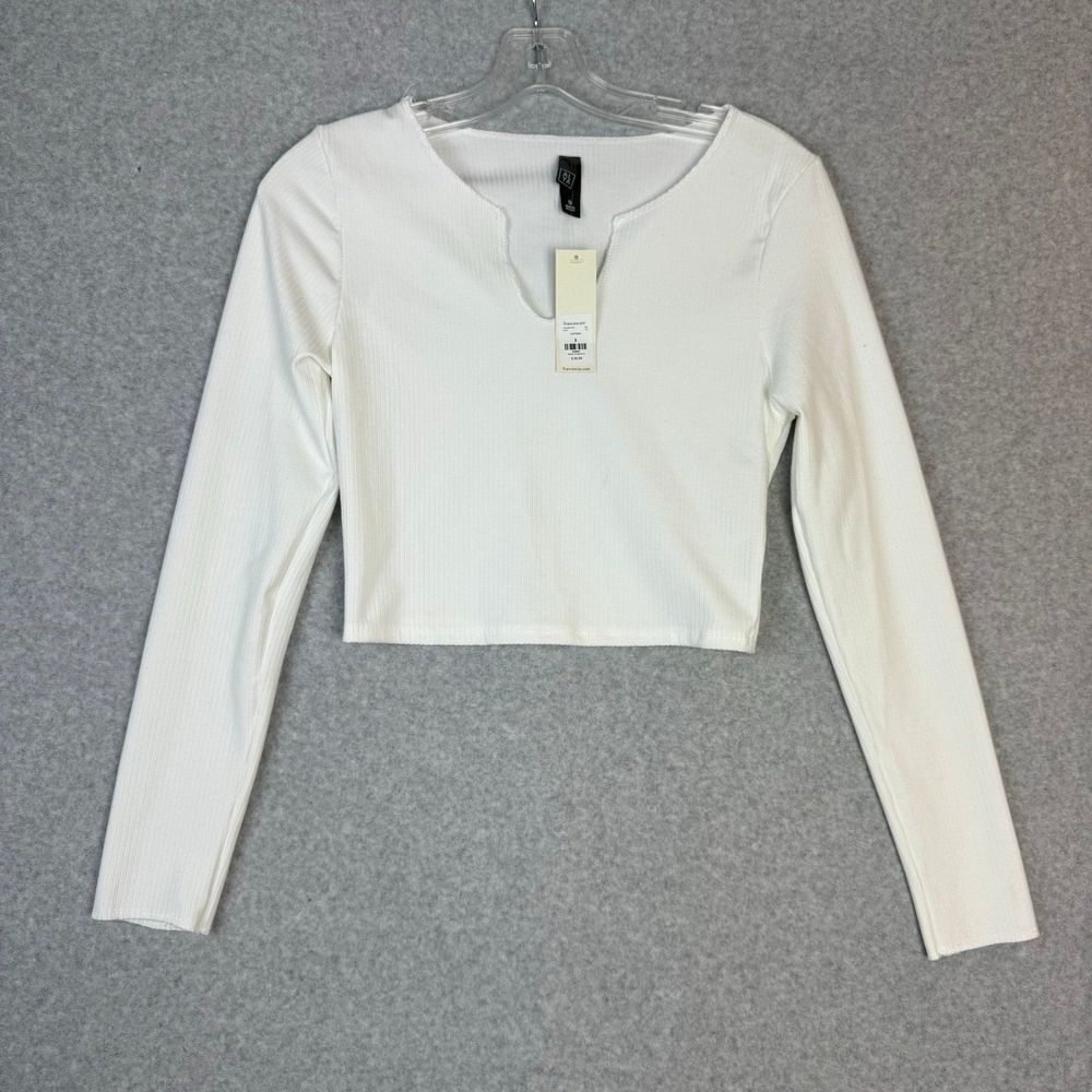 Francesca’s new white long sleeves top size small